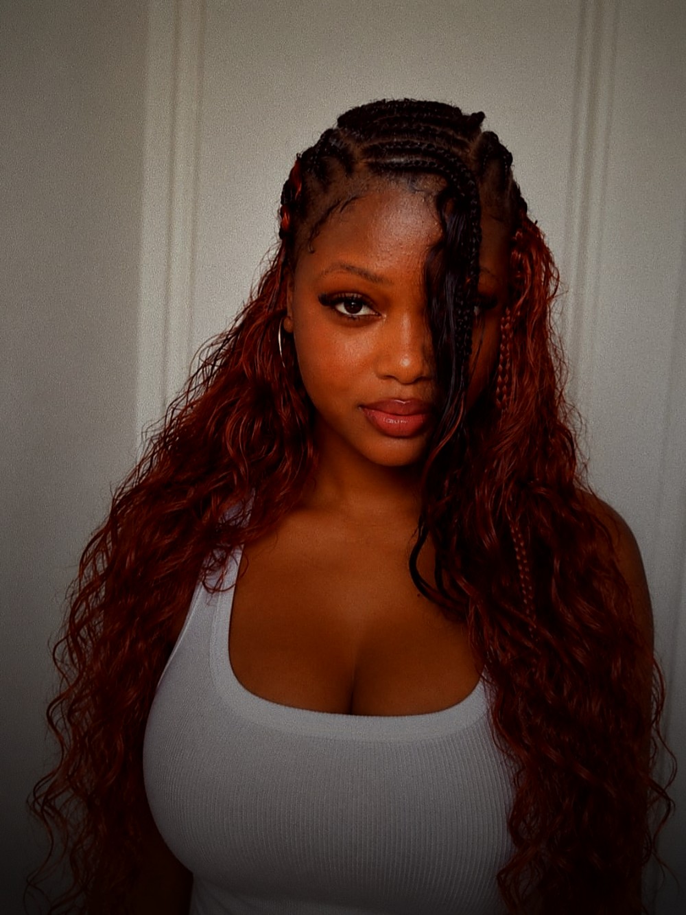 Tesah, photographed in copper braids